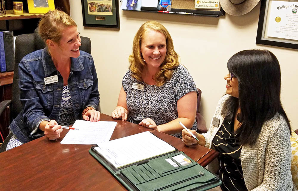 Next Gen Bankers
Ozarks Technical Community College is the first higher education institution to partner with Branson Bank for a new internship program. From left, Branson Bank’s Vice President of Marketing Halley Fleming and Marketing Operations Manager Lyndi Carnelison discuss program details with OTC student Yvonne Jones.