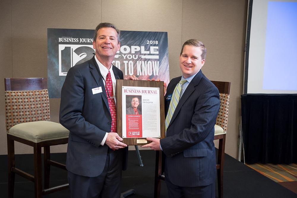 MSU BOUND
After announcing his next career step at Springfield Business Journal’s 12 People You Need to Know breakfast March 20, Nixa Public Schools Superintendent Stephen Kleinsmith, above, takes a picture with Brad Crain of event sponsor Arvest Bank.