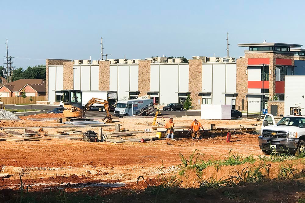The early stages of construction are visible on Republic Road for Magers Crossing’s third building.