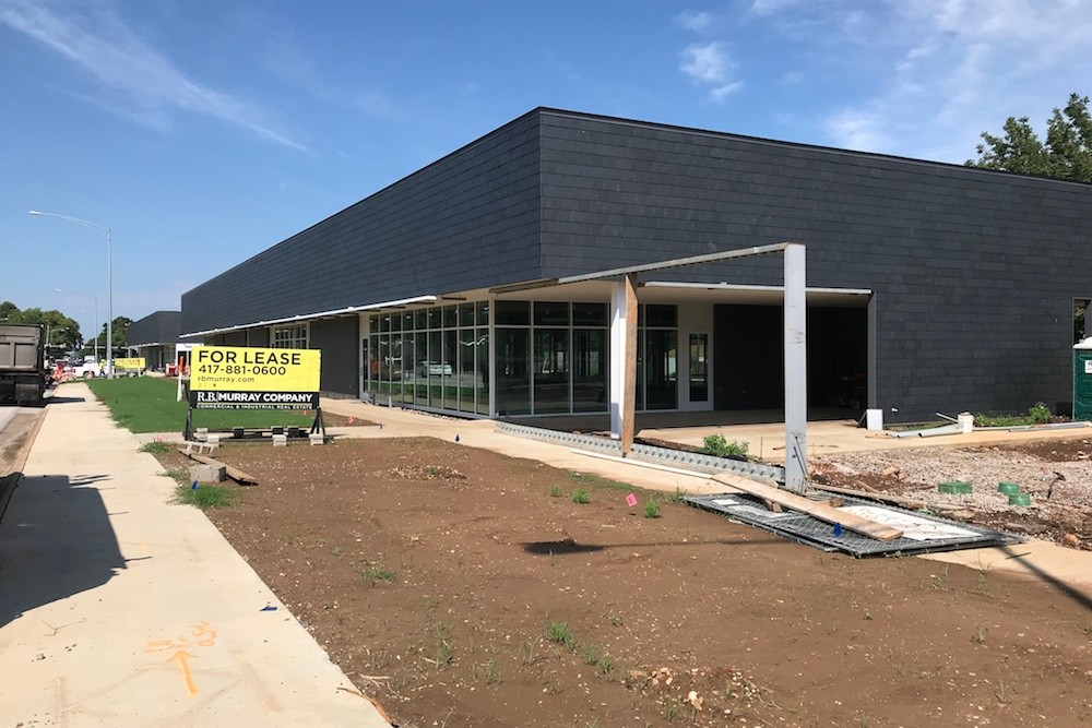 A retail and office center developed by Sagamore Hill Development Co. LLC is nearing completion.