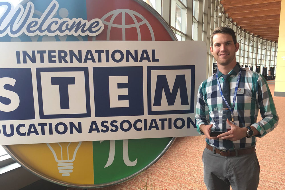 Top-Notch Teacher
Instructional technology facilitator Ryan Mahn of Nixa Public Schools’ John Thomas School of Discovery receives the Mike Neden STEM Championship Award at the international STEM Education Association’s conference Oct. 9 in Branson. The award honors leaders in science, technology, engineering and mathematics education. 