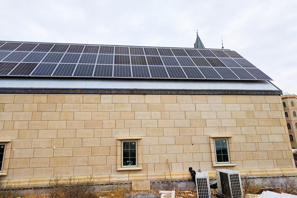 Solar panels cover the rooftop at Chateau Pensmore near Highlandville as part of a 208-panel solar energy system.