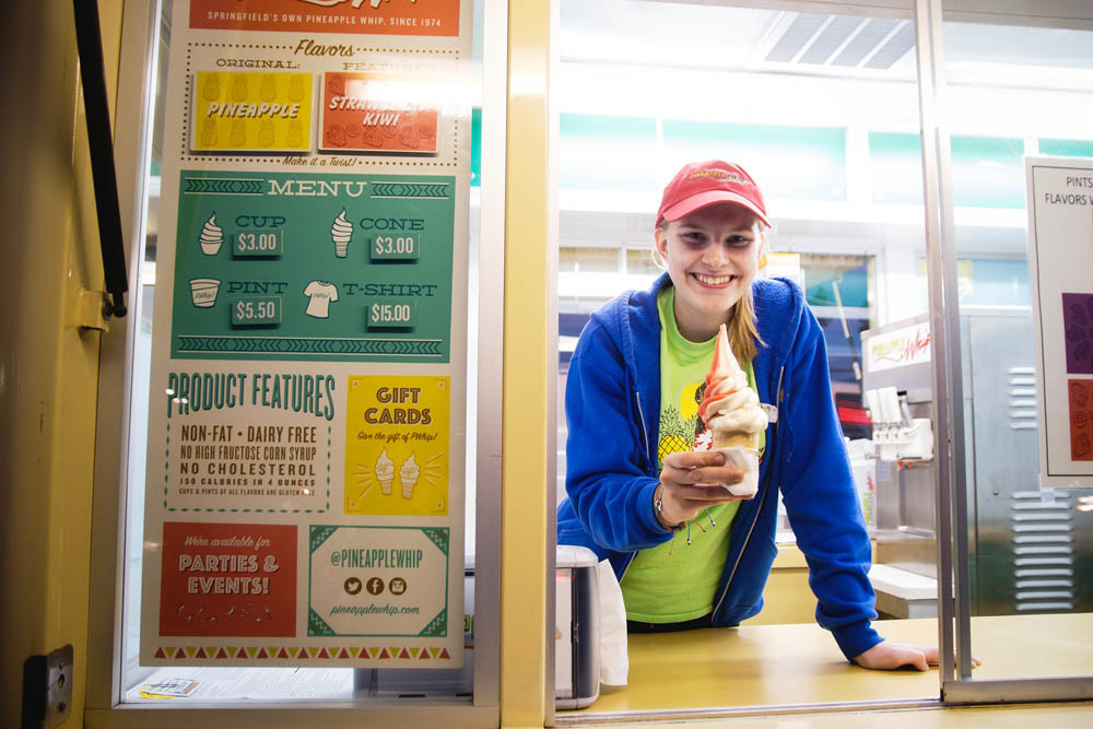 SUMMER DREAMING
Pineapple Whip opened its South Campbell Avenue stand Jan. 16-20 for the fifth-annual Whip Solstice, providing customers a taste of summer in the dead of winter. Above, employee Christina Burks serves up a pineapple and strawberry-kiwi swirl cone.