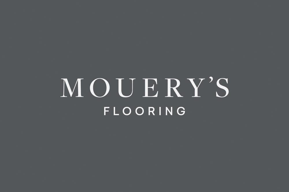 A NEW DESIGNATION: Longitude's work includes renaming locally owned Mouery's Flooring, formerly The Carpet Center.