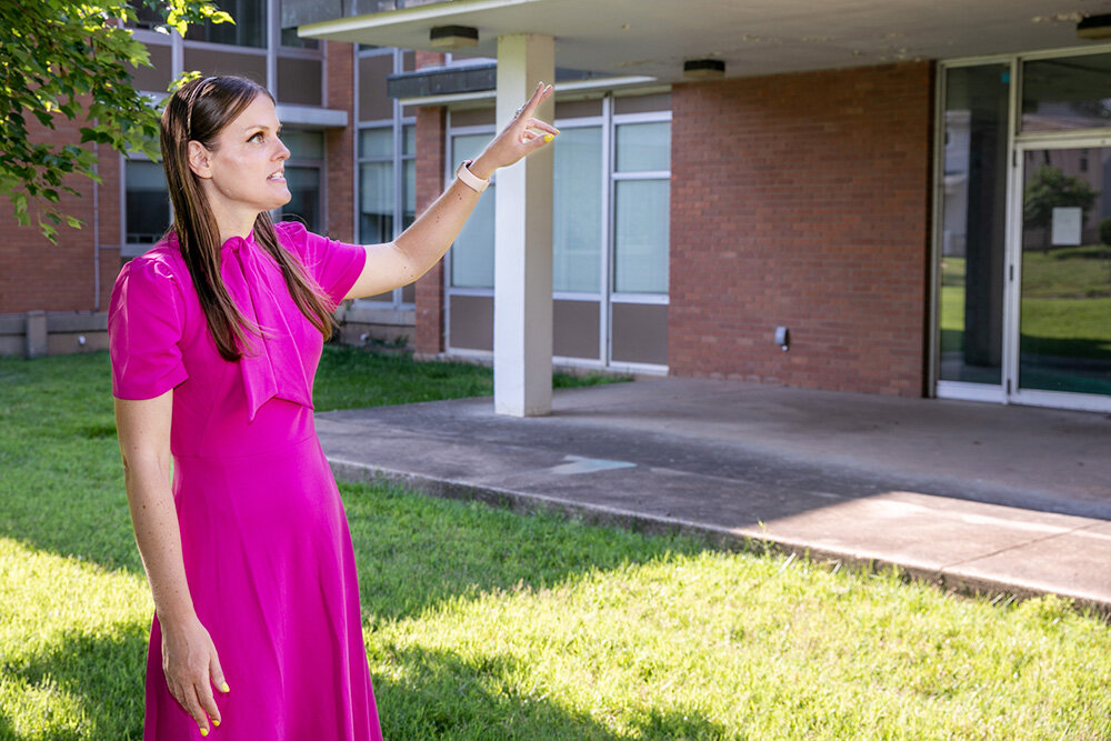 RESIDENTIAL WORK: Drury University’s Marie Muhvic points out ongoing maintenance work at Smith Hall, a residential dormitory targeted for additional renovation as part of the school’s campus master plan.